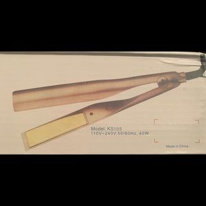 2-in-1 hair straightener & curling iron. Still in the original box. Never used.